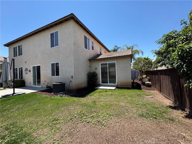 33314 Lazurite Way, Menifee, CA 92584 - rear view of property with stucco siding, a fenced backyard, a patio, and a tiled roof