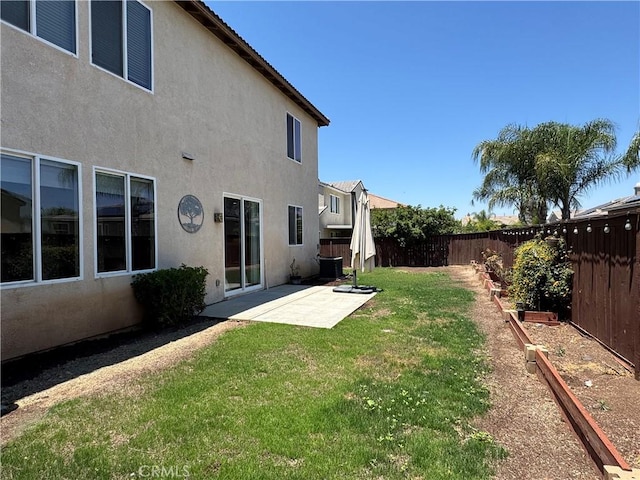 33314 Lazurite Way, Menifee, CA 92584 - fenced backyard with a vegetable garden and a patio