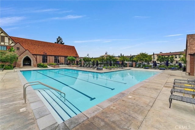 12342 Blue Sky Ct, Whittier, CA 90602 - community pool with a patio area