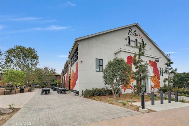 12342 Blue Sky Ct, Whittier, CA 90602 - view of side of property featuring stucco siding