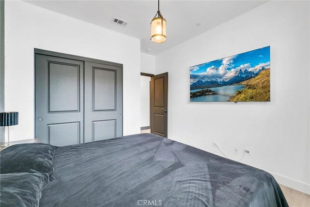 12342 Blue Sky Ct, Whittier, CA 90602 - bedroom featuring wood finished floors and baseboards
