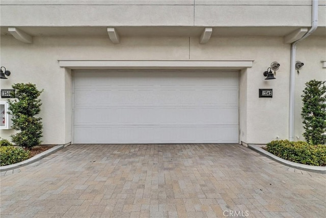 12342 Blue Sky Ct, Whittier, CA 90602 - garage featuring decorative driveway