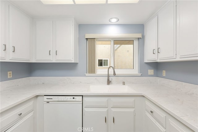 2386 Via Mariposa W Unit 2B, Laguna Woods, CA 92637 - kitchen featuring dishwasher and white cabinetry
