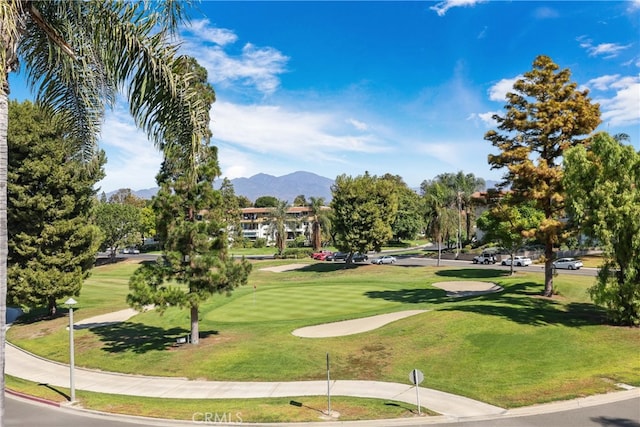 2386 Via Mariposa W Unit 2B, Laguna Woods, CA 92637 - view of community featuring a mountain view, golf course view, and a lawn