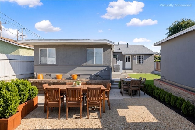 1517 W Grand Ave, Pomona, CA 91766 - fenced backyard with outdoor dining area and a patio