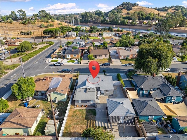 1517 W Grand Ave, Pomona, CA 91766 - aerial view of residential area featuring a mountainous background