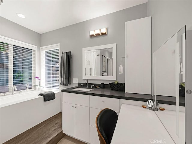 15017 Archwood St, Van Nuys, CA 91405 - full bathroom with wood finished floors and vanity