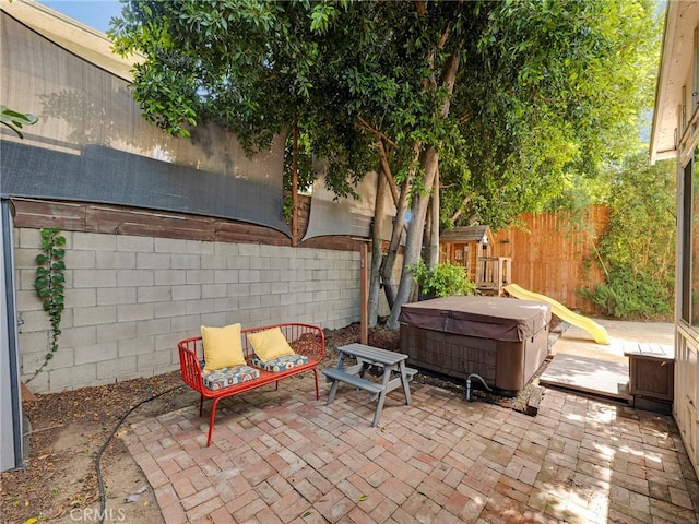 15017 Archwood St, Van Nuys, CA 91405 - view of patio with a hot tub