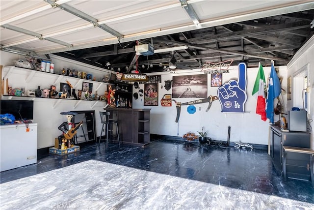2561 E Washington St, Carson, CA 90810 - garage featuring a garage door opener