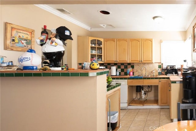 2561 E Washington St, Carson, CA 90810 - kitchen with tile countertops, light tile patterned flooring, crown molding, light brown cabinetry, and tasteful backsplash