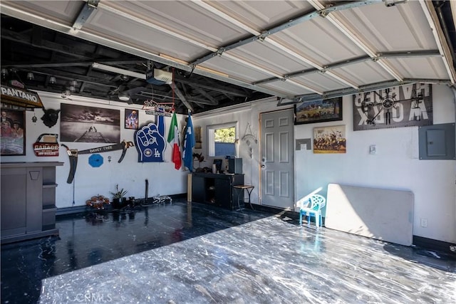 2561 E Washington St, Carson, CA 90810 - garage featuring electric panel and a garage door opener