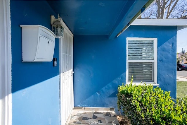 2561 E Washington St, Carson, CA 90810 - doorway to property with stucco siding