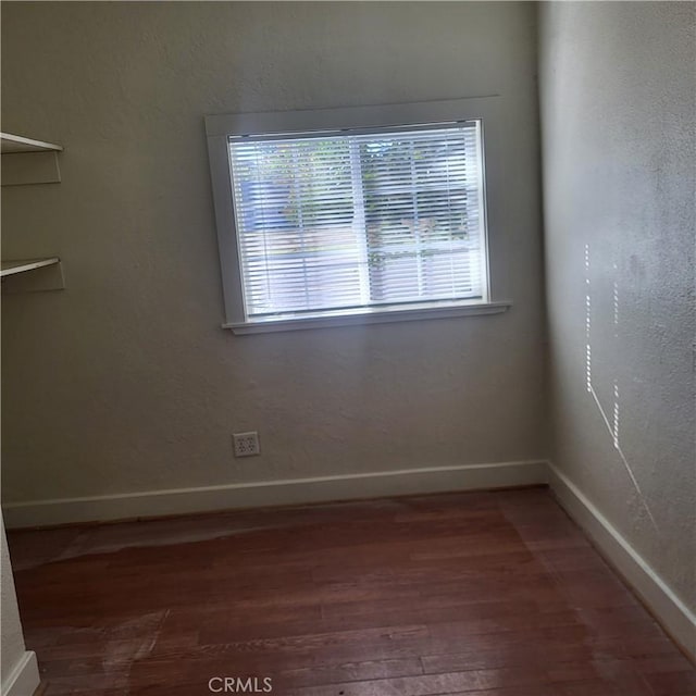 1048 W 5th St, Chico, CA 95928 - unfurnished room with wood finished floors and healthy amount of natural light