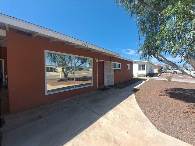 1920 Flora, Needles, CA 92363 - view of property exterior featuring stucco siding