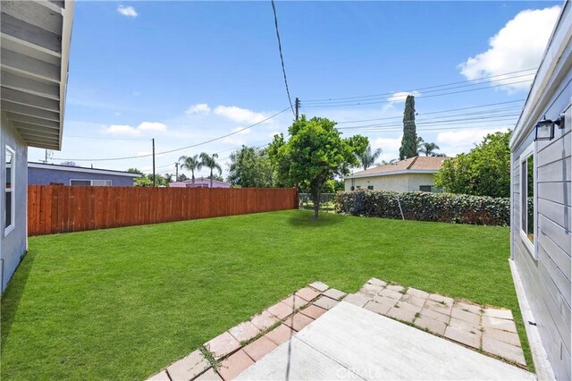 4003 Puente Ave, Baldwin Park, CA 91706 - fenced backyard with a patio area