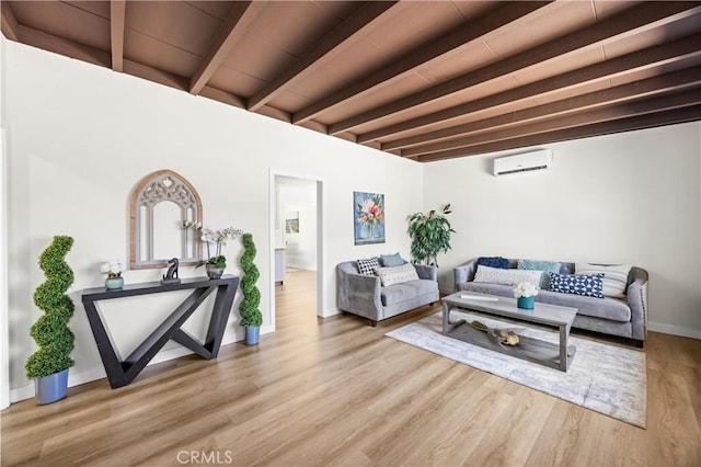4003 Puente Ave, Baldwin Park, CA 91706 - living room featuring an AC wall unit, wood finished floors, and a wood ceiling with exposed beams