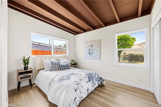4003 Puente Ave, Baldwin Park, CA 91706 - bedroom featuring multiple windows and light wood-style floors