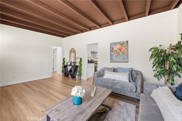 4003 Puente Ave, Baldwin Park, CA 91706 - living room with beamed ceiling, light wood-type flooring, and a towering ceiling