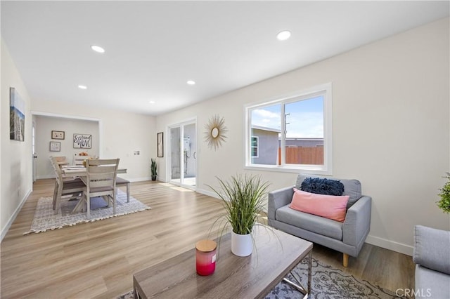 4003 Puente Ave, Baldwin Park, CA 91706 - living room featuring light wood-style flooring and recessed lighting