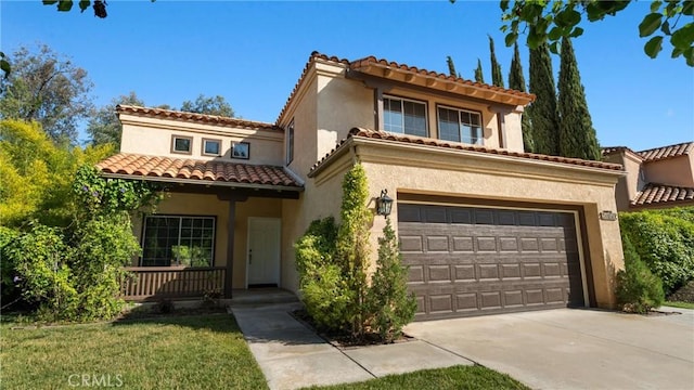 31850 Camino Marea, Temecula, CA 92592 - mediterranean / spanish-style house featuring stucco siding, driveway, covered porch, and an attached garage