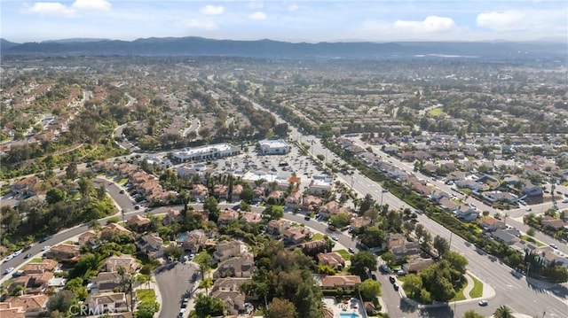 31850 Camino Marea, Temecula, CA 92592 - aerial view of property and surrounding area featuring a mountainous background and nearby suburban area