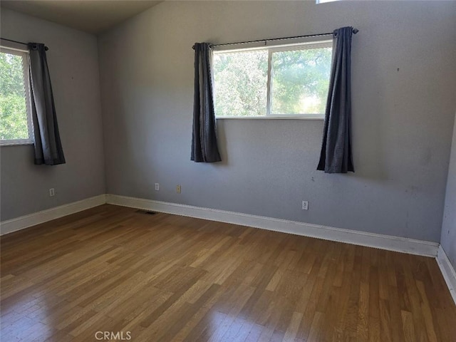 2723 Apache Trl, Clearlake Oaks, CA 95423 - spare room featuring wood finished floors and baseboards