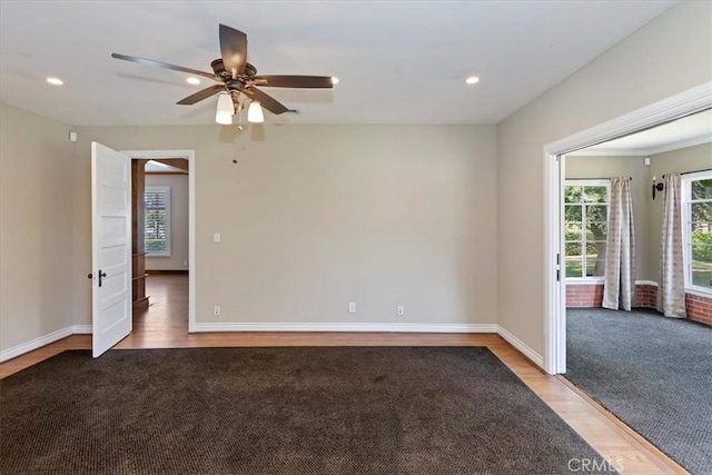 1350 E Chase Dr, Corona, CA 92881 - carpeted empty room featuring wood finished floors, ceiling fan, and recessed lighting
