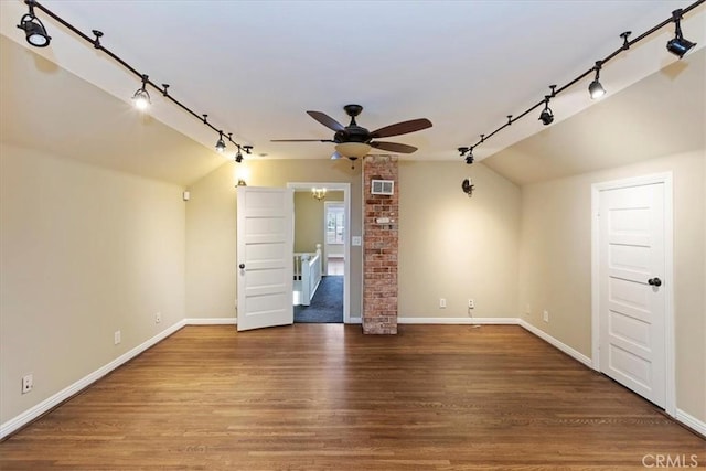 1350 E Chase Dr, Corona, CA 92881 - spare room featuring rail lighting, vaulted ceiling, a ceiling fan, and wood finished floors