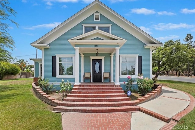 1350 E Chase Dr, Corona, CA 92881 - view of front of house with a porch and a front yard