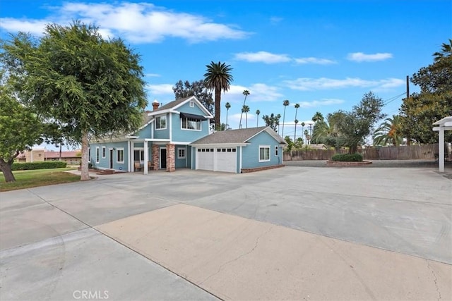 1350 E Chase Dr, Corona, CA 92881 - view of front of home featuring driveway, a garage, and a porch