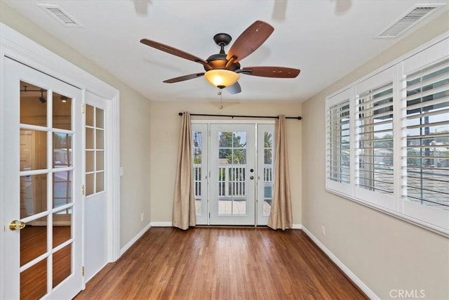 1350 E Chase Dr, Corona, CA 92881 - doorway to outside featuring wood finished floors and a ceiling fan