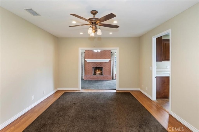 1350 E Chase Dr, Corona, CA 92881 - unfurnished living room featuring light wood finished floors, recessed lighting, a fireplace, and ceiling fan