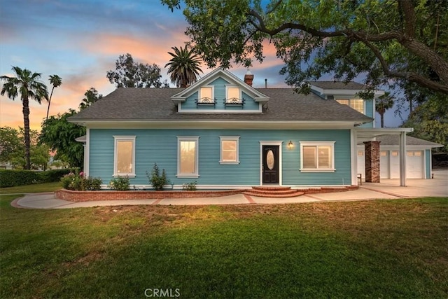 1350 E Chase Dr, Corona, CA 92881 - view of front of house featuring a lawn, a chimney, concrete driveway, and an attached garage