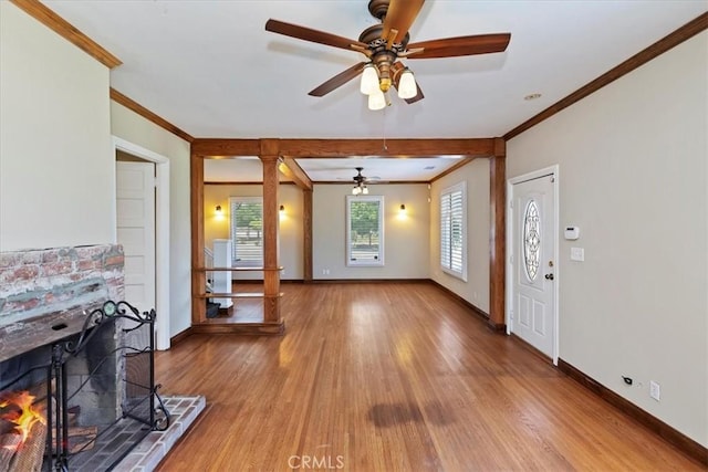 1350 E Chase Dr, Corona, CA 92881 - living area featuring ornamental molding, a ceiling fan, and wood finished floors
