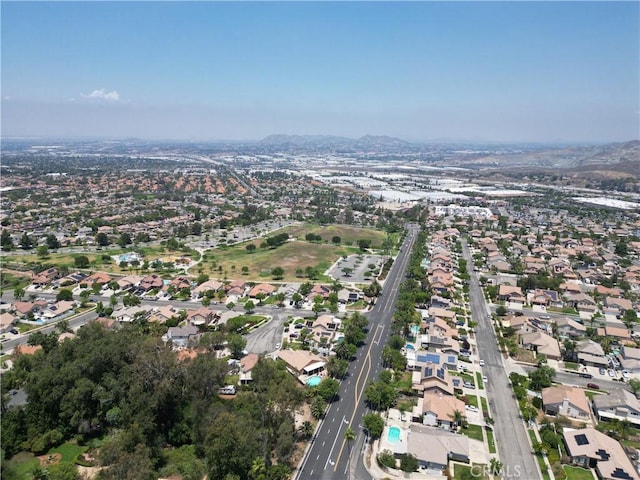 1350 E Chase Dr, Corona, CA 92881 - aerial view of property's location featuring nearby suburban area and a mountainous background