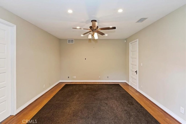 1350 E Chase Dr, Corona, CA 92881 - spare room featuring wood finished floors, ceiling fan, and recessed lighting