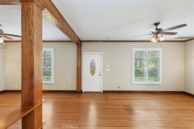 1350 E Chase Dr, Corona, CA 92881 - entryway featuring ceiling fan, wood finished floors, plenty of natural light, and ornamental molding