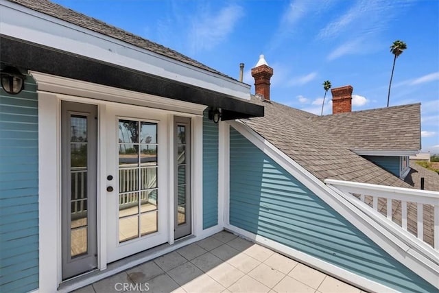 1350 E Chase Dr, Corona, CA 92881 - entrance to property with roof with shingles and a chimney