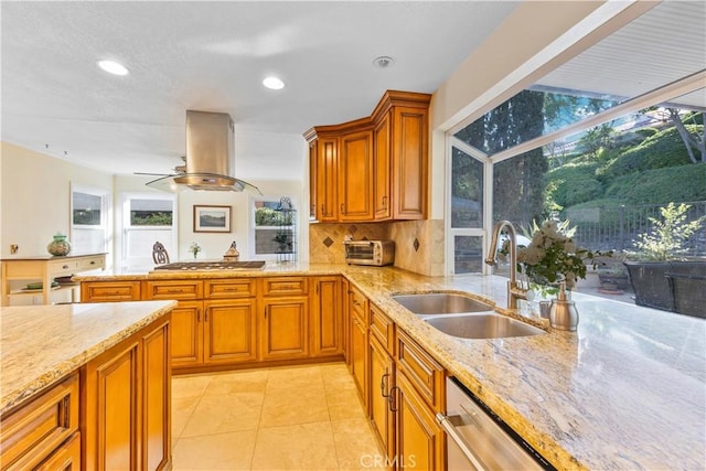 28161 Haria, Mission Viejo, CA 92692 - kitchen with island range hood, brown cabinetry, plenty of natural light, light stone counters, and recessed lighting