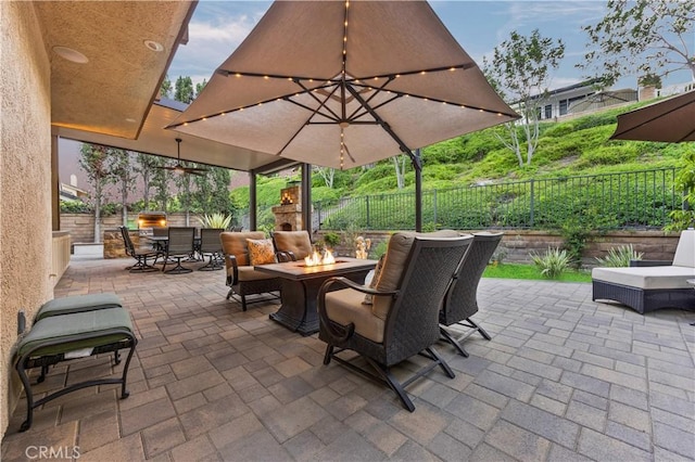 28161 Haria, Mission Viejo, CA 92692 - fenced backyard featuring a fireplace, a patio, and outdoor dining space
