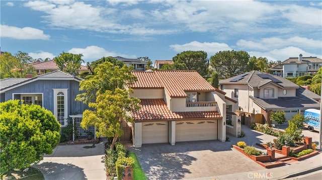 28161 Haria, Mission Viejo, CA 92692 - view of front of home featuring a tile roof, driveway, stucco siding, and a residential view