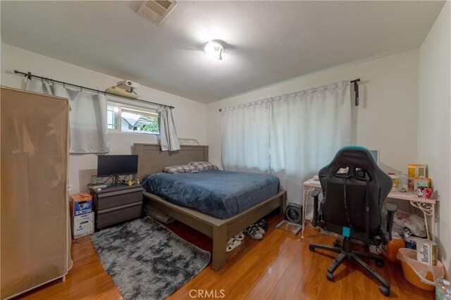 1454 Ameluxen Ave, Hacienda Heights, CA 91745 - bedroom with wood finished floors and an office area