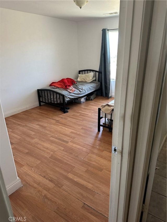 37920 Pisces Cir, Palmdale, CA 93552 - bedroom featuring wood finished floors and baseboards