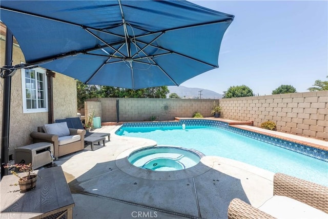 2091 Ridgeview, Corona, CA 92882 - view of swimming pool with a fenced backyard, a pool with connected hot tub, and a patio