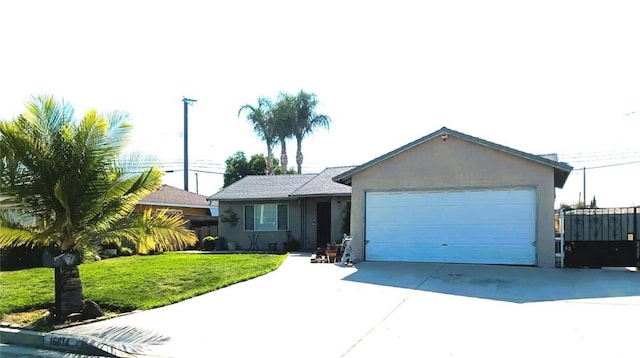 16614 Samgerry Dr, Valinda, CA 91744 - single story home with stucco siding, driveway, a front lawn, and a garage