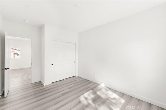 1359 Point Loma Pl, Walnut, CA 91789 - unfurnished bedroom featuring light wood finished floors and a closet