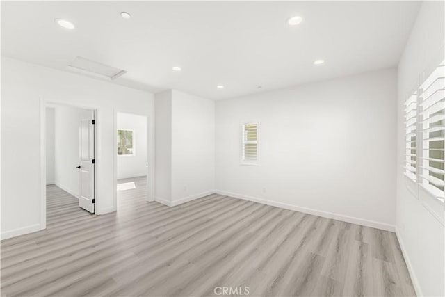 1359 Point Loma Pl, Walnut, CA 91789 - spare room with attic access, light wood finished floors, and recessed lighting