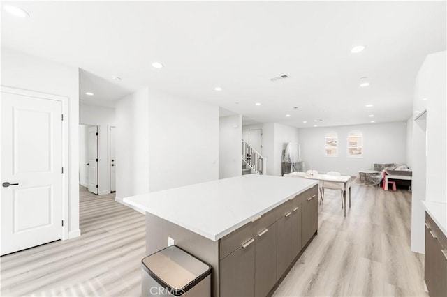 1359 Point Loma Pl, Walnut, CA 91789 - kitchen featuring a kitchen island, light wood-type flooring, gray cabinetry, recessed lighting, and modern cabinets