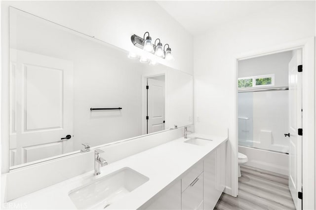 1359 Point Loma Pl, Walnut, CA 91789 - bathroom with double vanity, wood finished floors, and enclosed tub / shower combo