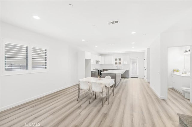 1359 Point Loma Pl, Walnut, CA 91789 - dining area with light wood-type flooring and recessed lighting